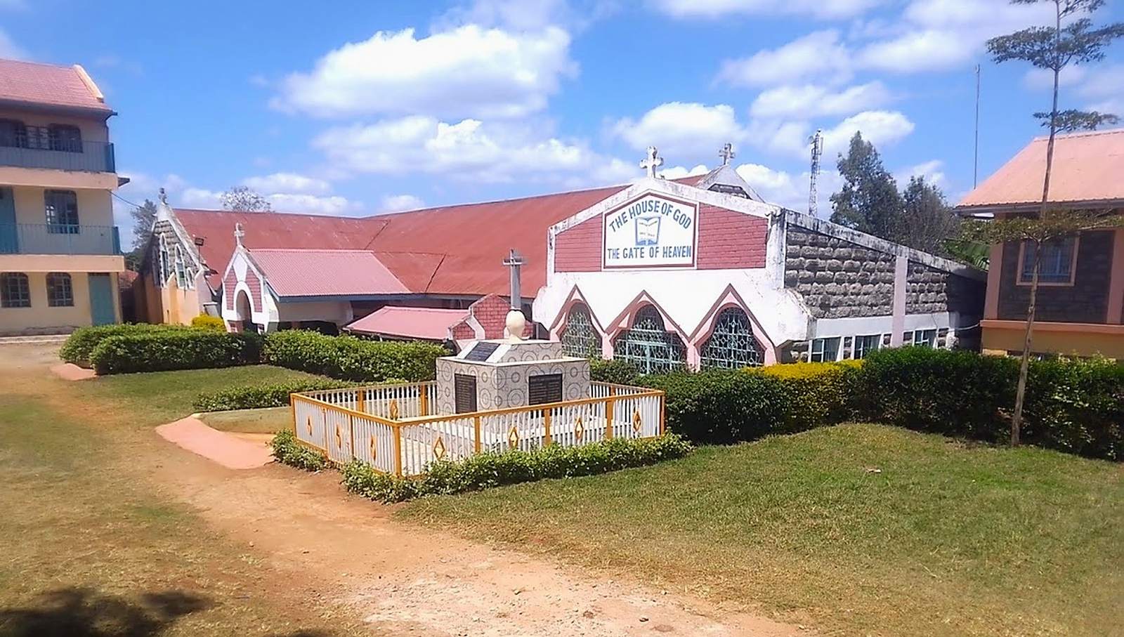 ACK St. James Kanyange church building, memorial garden, and 'The House of God, Gate of Heaven' facade